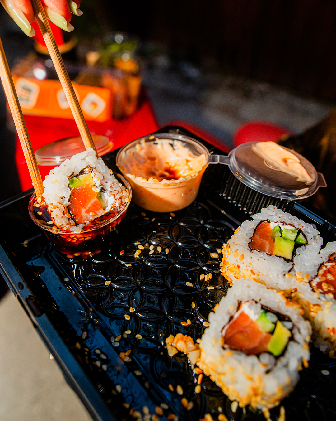 WokWok sushi with chopsticks